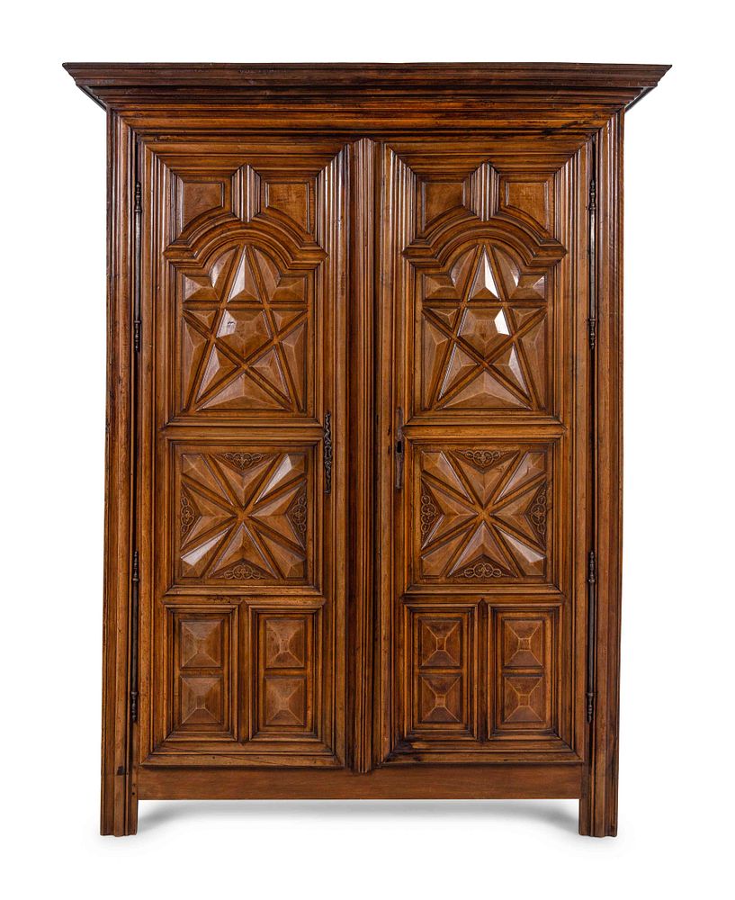 Appraisal: A Louis XIII Style Carved Walnut Armoire A Louis XIII