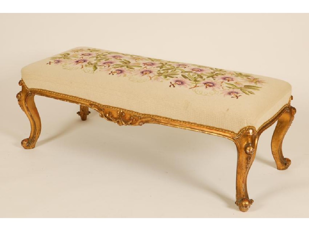 Appraisal: AN EARLY VICTORIAN GILTWOOD STOOL with floral tapestry upholstery and