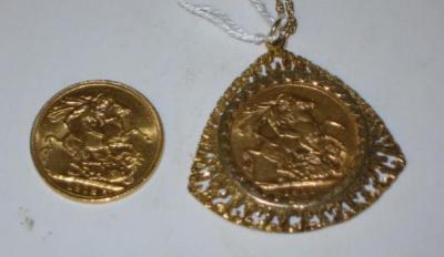 Appraisal: TWO GOLD SOVEREIGNS dated and one set in ct gold