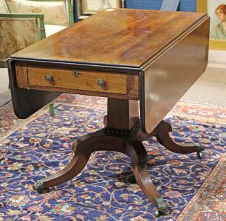 Appraisal: Regency mahogany drop leaf table Regency mahogany drop leaf table