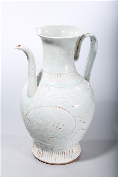 Appraisal: Tall Chinese monochrome crackle glazed ewer with incised floral design