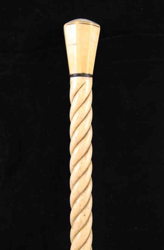 Appraisal: A th century whale bone and marine ivory walking stick