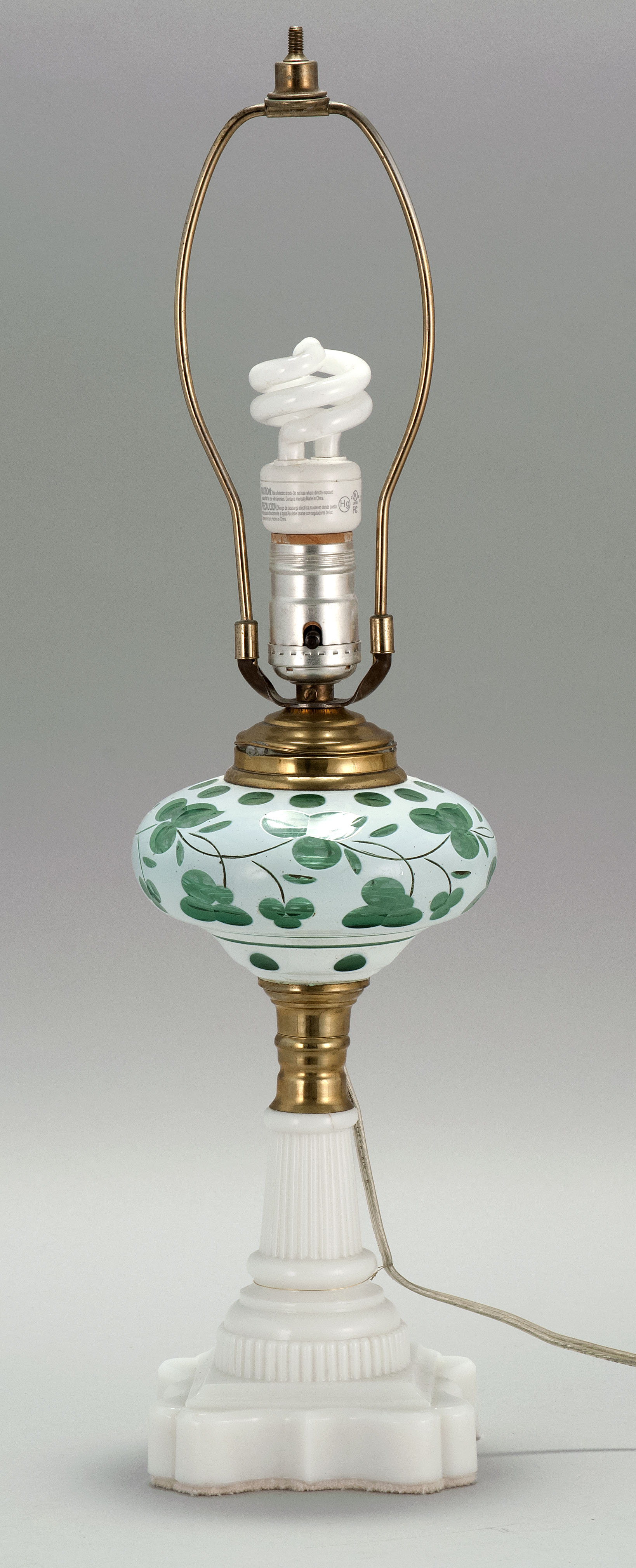 Appraisal: SANDWICH CUT OVERLAY GLASS LAMP th Century font in opaque