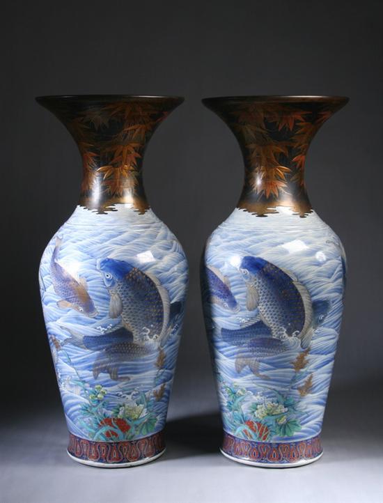 Appraisal: PAIR JAPANESE FUKUGAWA PORCELAIN TEMPLE VASES Meiji period Well painted