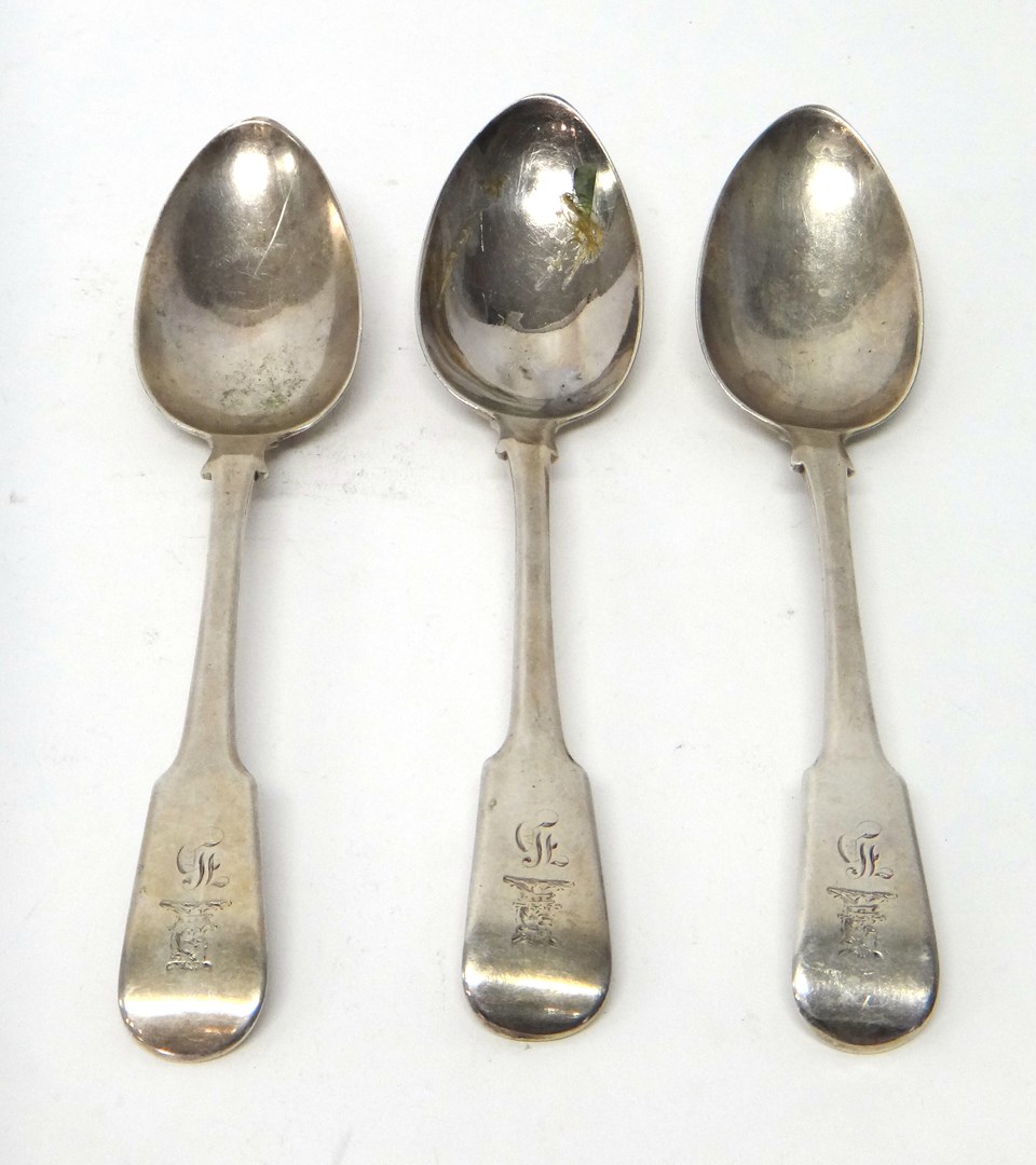 Appraisal: Three silver fiddle pattern tablespoons each engraved with a crest