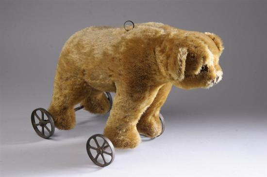 Appraisal: MOHAIR BEAR ON WHEELS WITH GROWLING MECHANISM Probably s Mohair