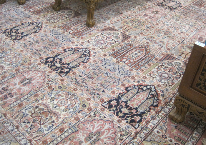 Appraisal: HAND KNOTTED ORIENTAL CARPET Indo-Persian repeating prayer panel design '