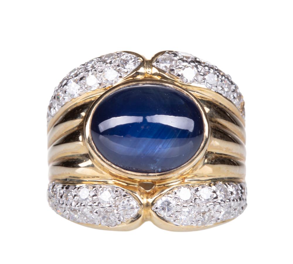 Appraisal: kt Yellow Gold Cabochon Sapphire and Diamond Ring central bezel