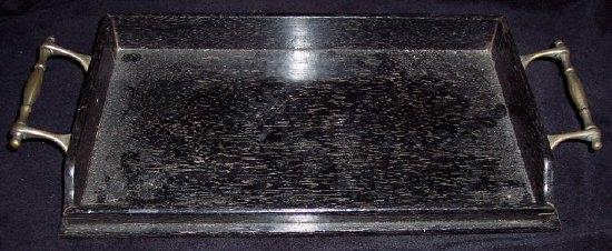 Appraisal: A small two-handled ebonised tray cm wide