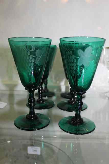 Appraisal: A SET OF SEVEN BRISTOL GREEN WINE GLASSES with engraved