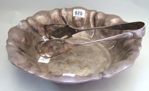 Appraisal: A German shaped circular bowl with fluted decoration detailed HANDARBEIT