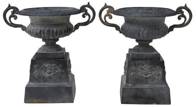 Appraisal: pair Large cast iron garden urns having patterned rim dual