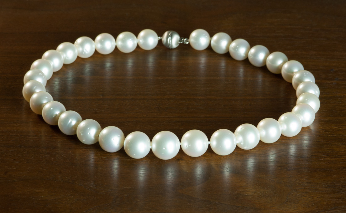 Appraisal: WHITE SOUTH SEA PEARL NECKLACE measuring - inches in length