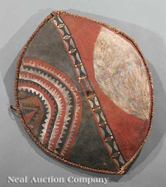 Appraisal: A Kenyan Painted Hide Shield Kikuya or Massai of almond