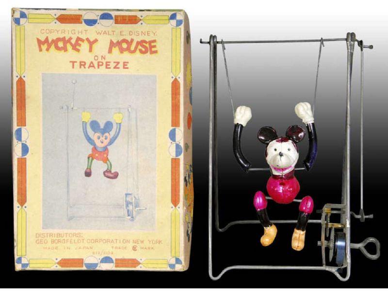 Appraisal: Celluloid Wind-Up Mickey Mouse Trapeze Toy with Or Description -