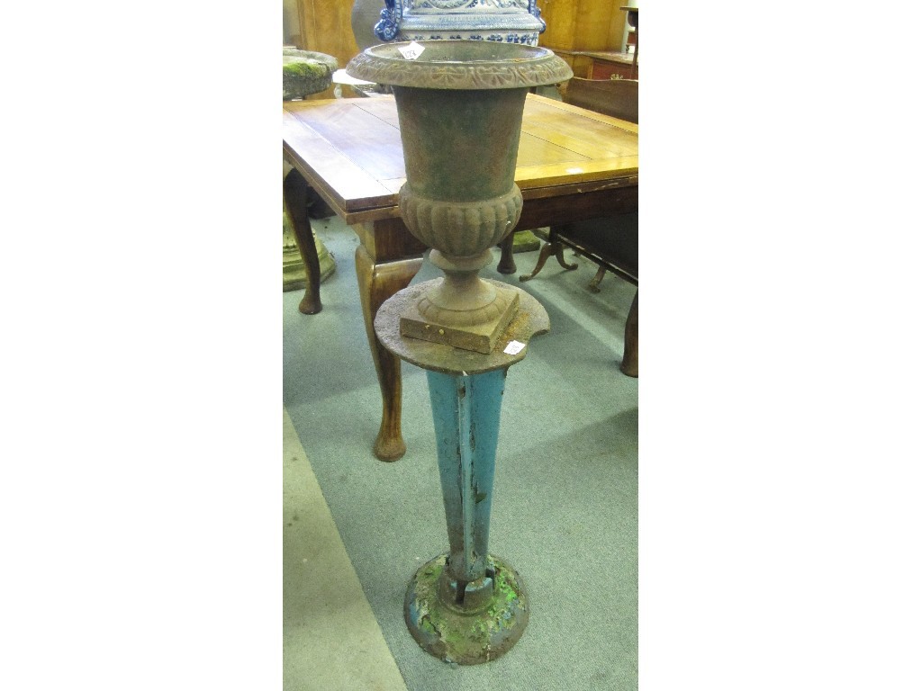 Appraisal: Pair of painted cast iron pedestals with a pair of