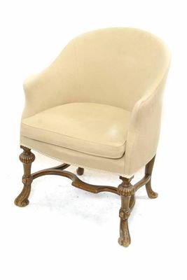 Appraisal: A tub armchair in late th century style on stretchered