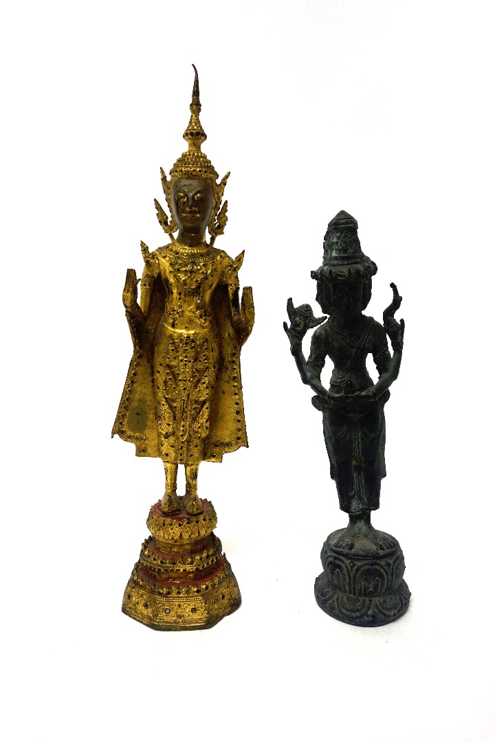 Appraisal: A Thai gilt-bronze figure of a standing Buddha probably th