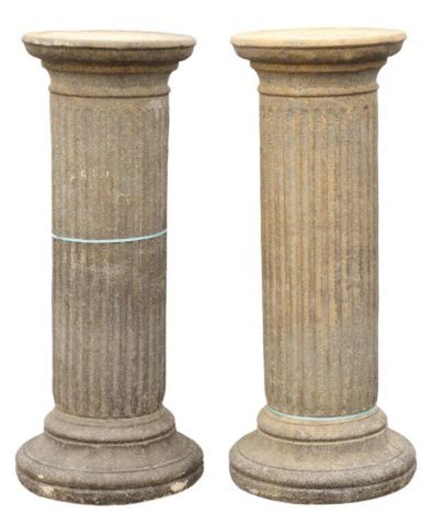 Appraisal: pair Cast stone fluted columns on integral base approx h