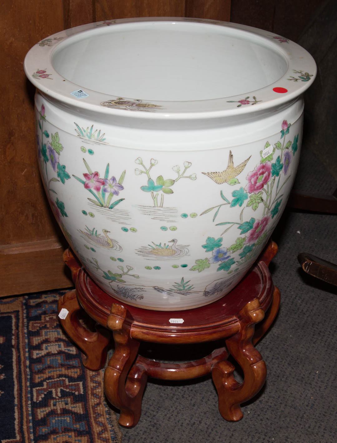 Appraisal: Oriental style fish bowl on stand