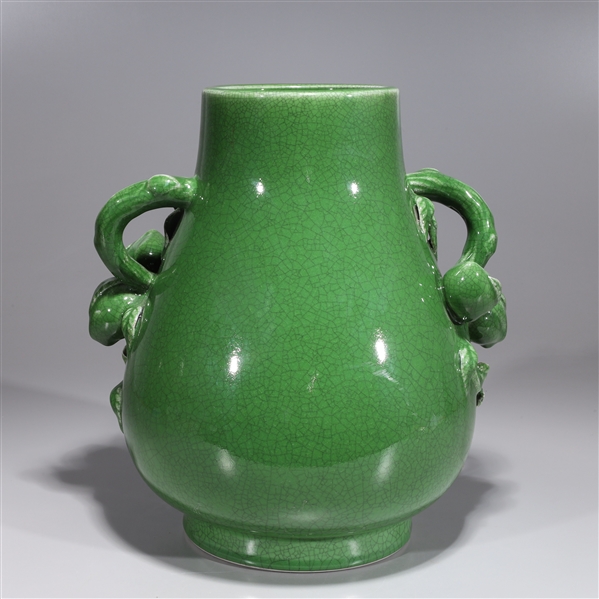 Appraisal: Large Chinese green crackle glazed porcelain vase with peach handles