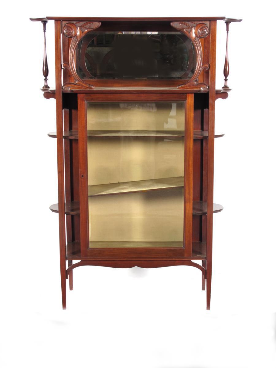 Appraisal: A Bath Cabinet Makers mahogany display cabinet