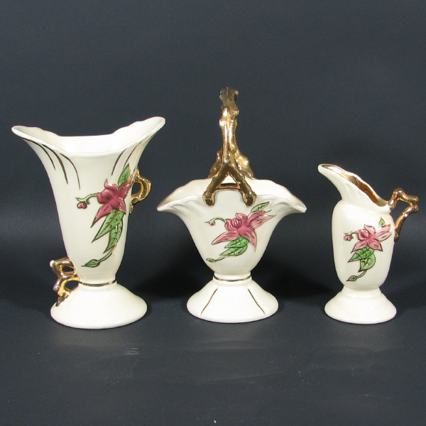 Appraisal: Hull Woodland Gloss Gold - Basket Vases Ewer Lot of