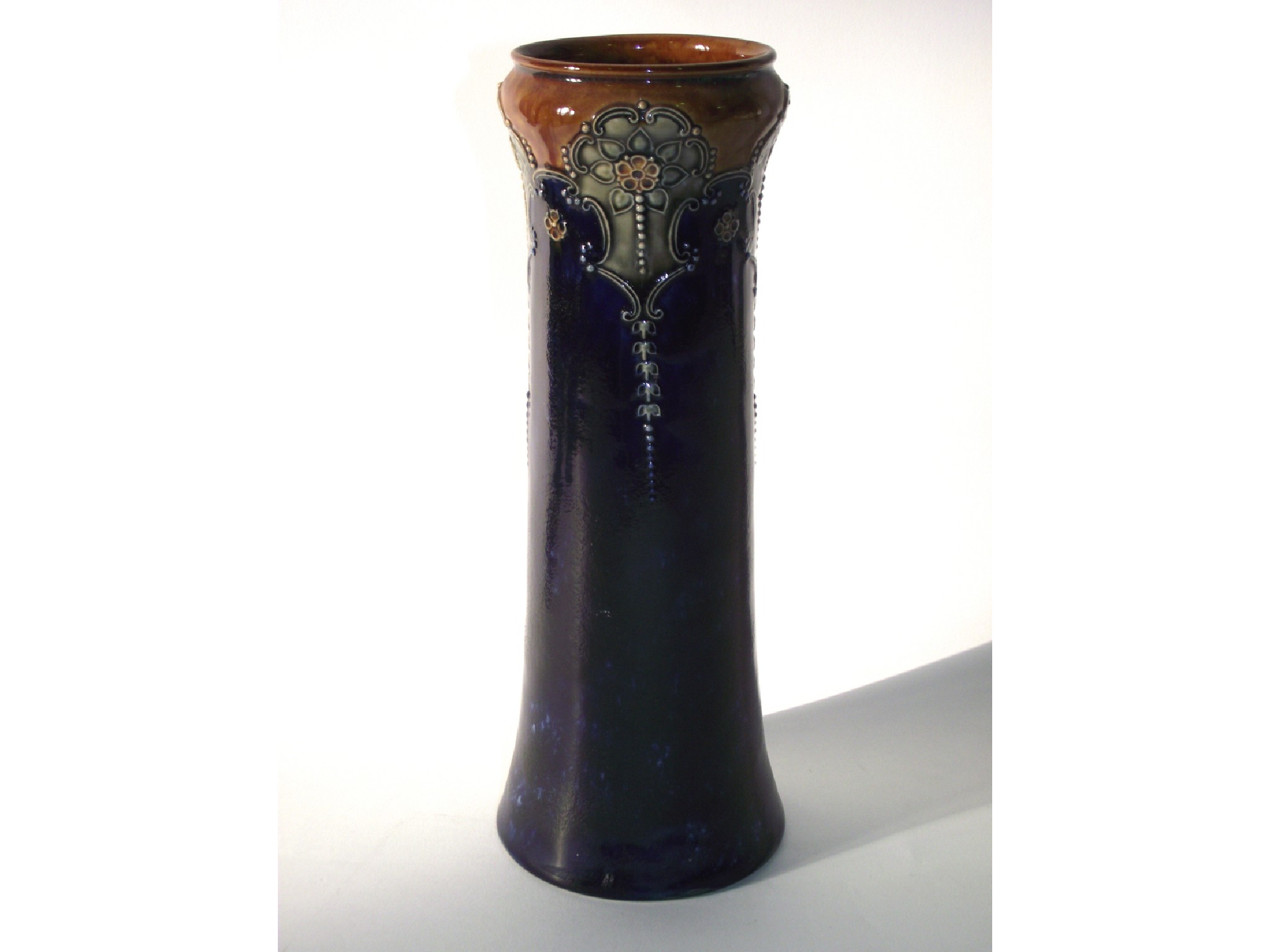 Appraisal: A Royal Doulton vase of cylindrical form with moulded and