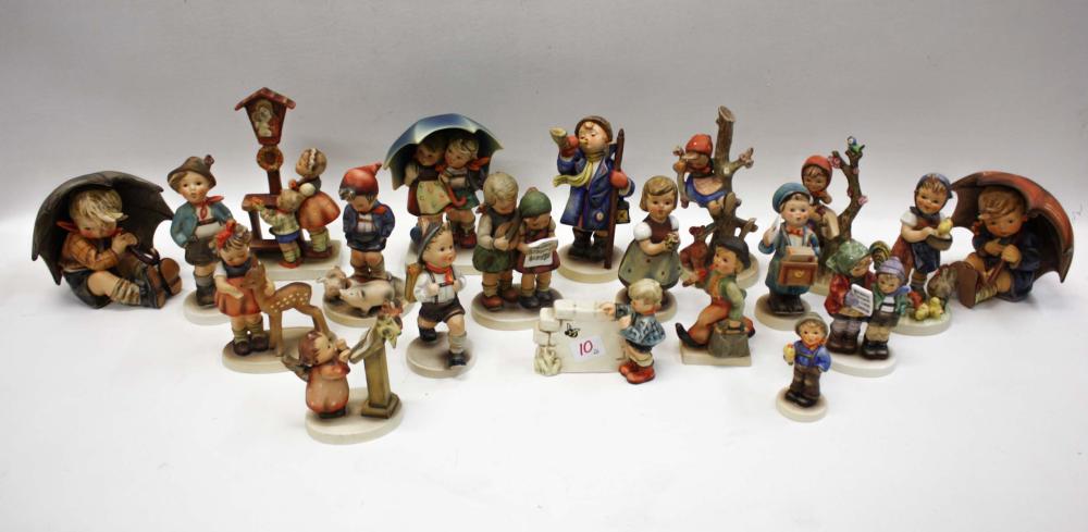 Appraisal: TWENTY PORCELAIN HUMMEL FIGURINES marks include TM- to TM- -current