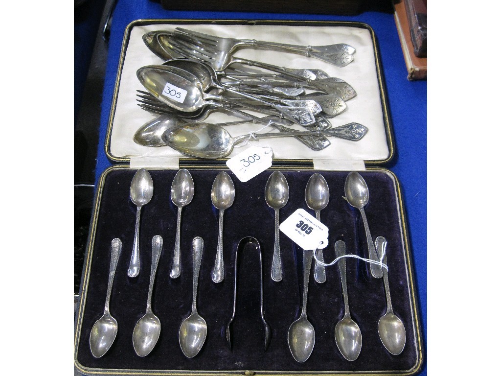 Appraisal: Lot comprising cased silver spoon and tong set and a