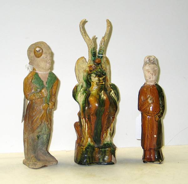 Appraisal: Three sancai glazed pottery figures Including a horned zhenmushou and