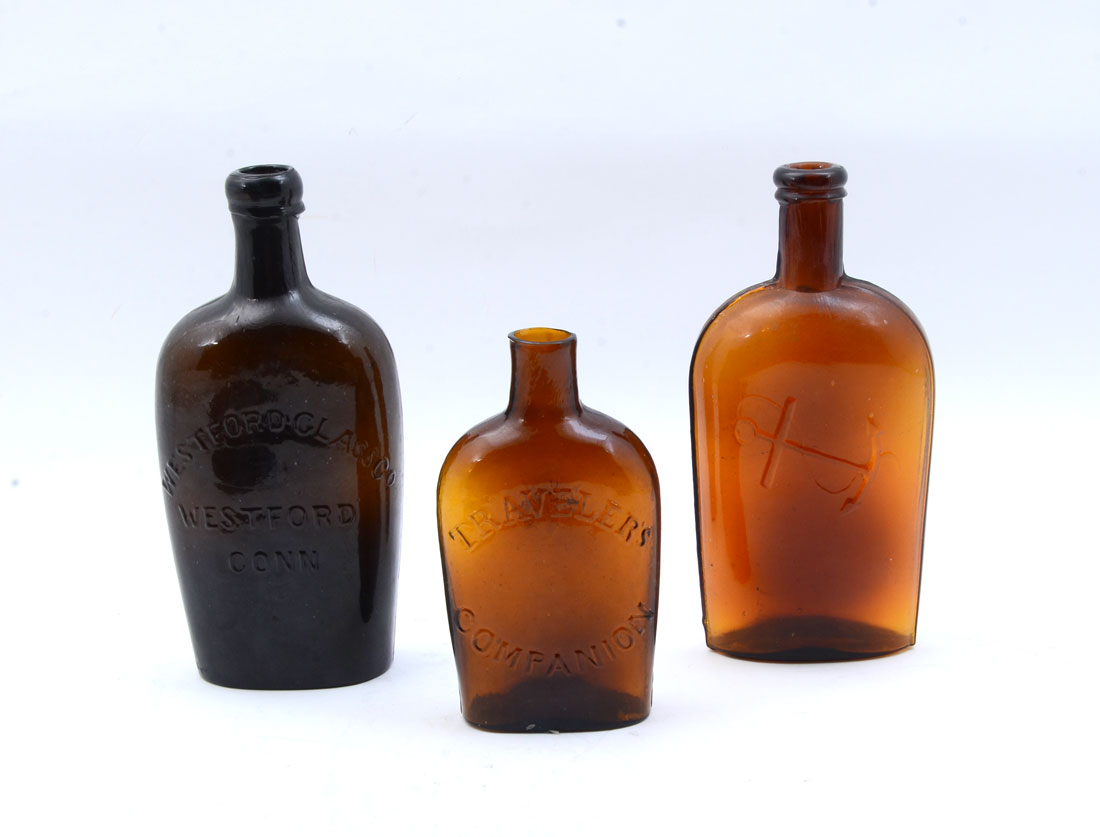 Appraisal: COLLECTION OF AMBER HISTORICAL FLASKS An assembled collection of antiques