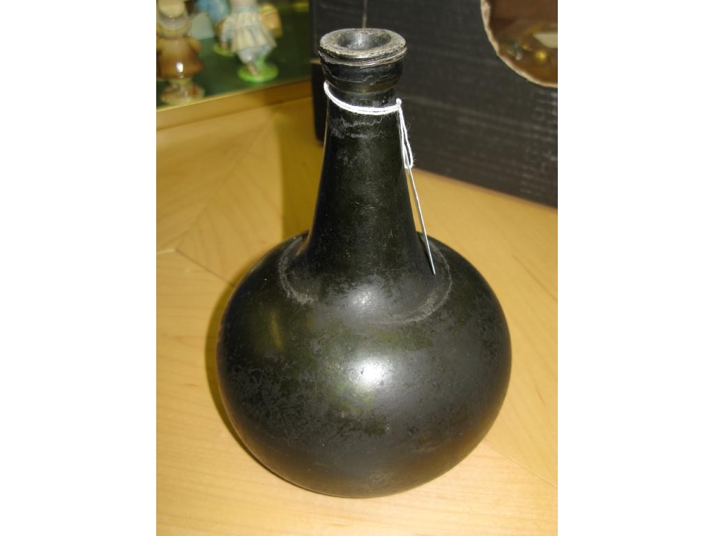 Appraisal: An early th Century 'onion' wine bottle with string rim