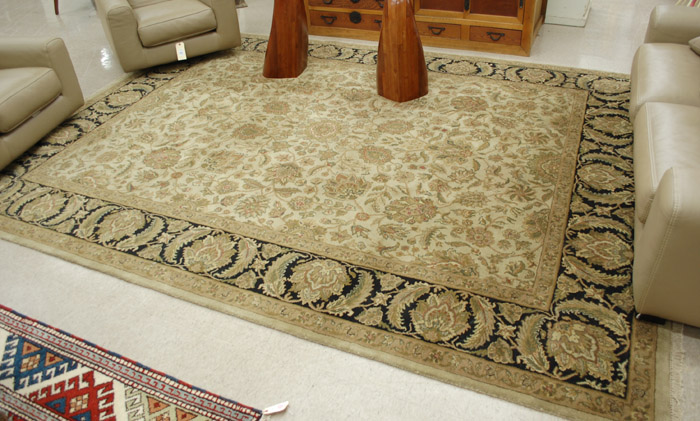 Appraisal: HAND KNOTTED ORIENTAL CARPET Indo-Persian overall foliate design on light