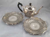 Appraisal: A pair of silver plated shaped and embossed dishes cm