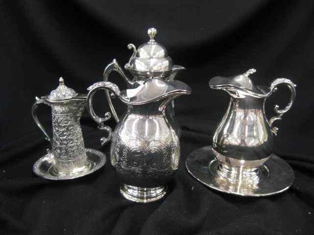 Appraisal: Silver Silverplated Syrup Pitchers one English two Victorian one Persian