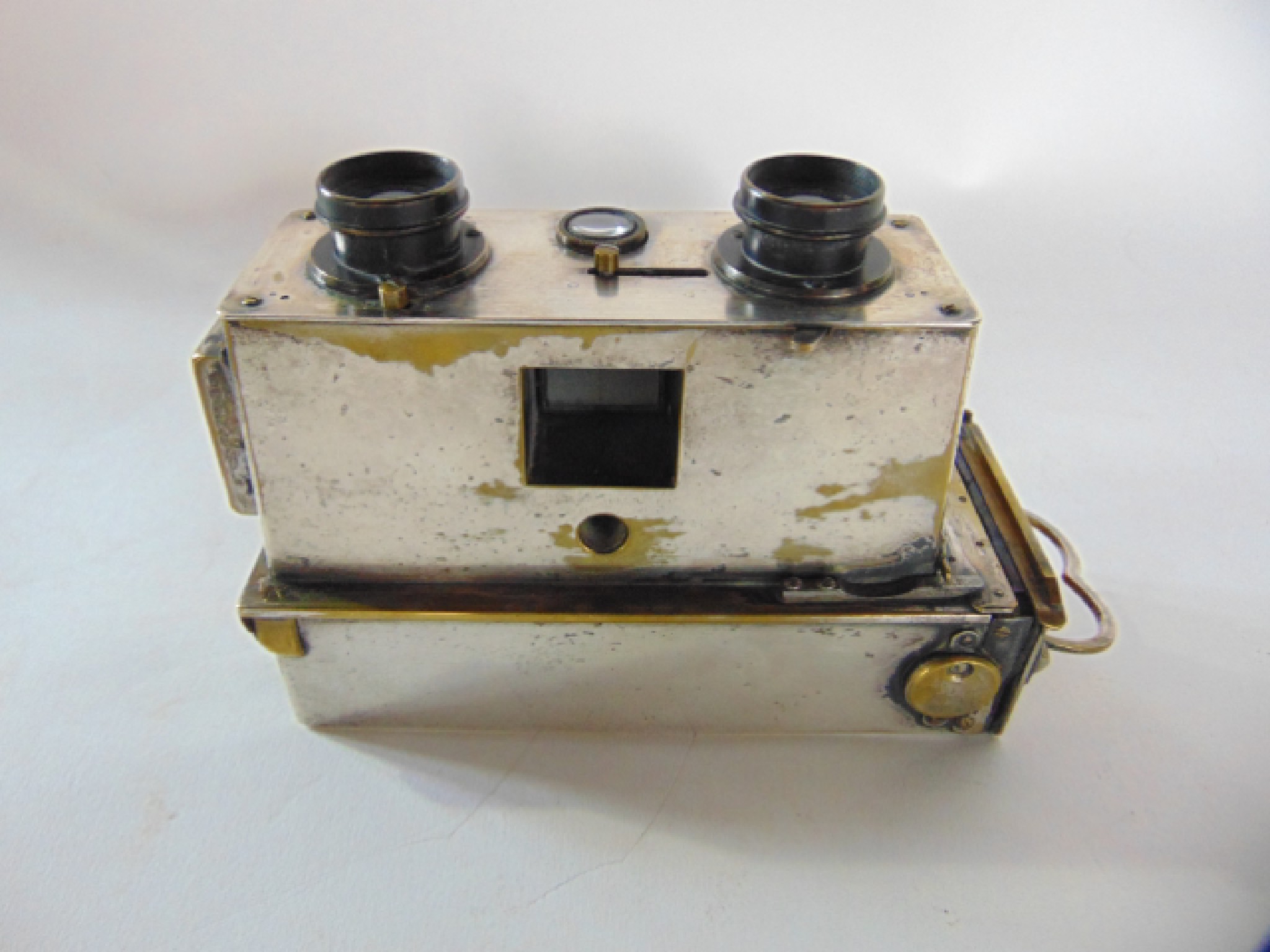 Appraisal: An early th century stereoscopic plate camera with silver plated