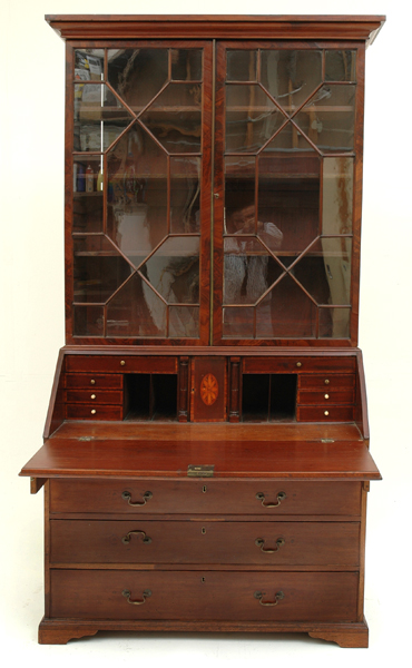 Appraisal: A GEORGE III FLAME MAHOGANY BUREAU BOOKCASE The ogee cornice