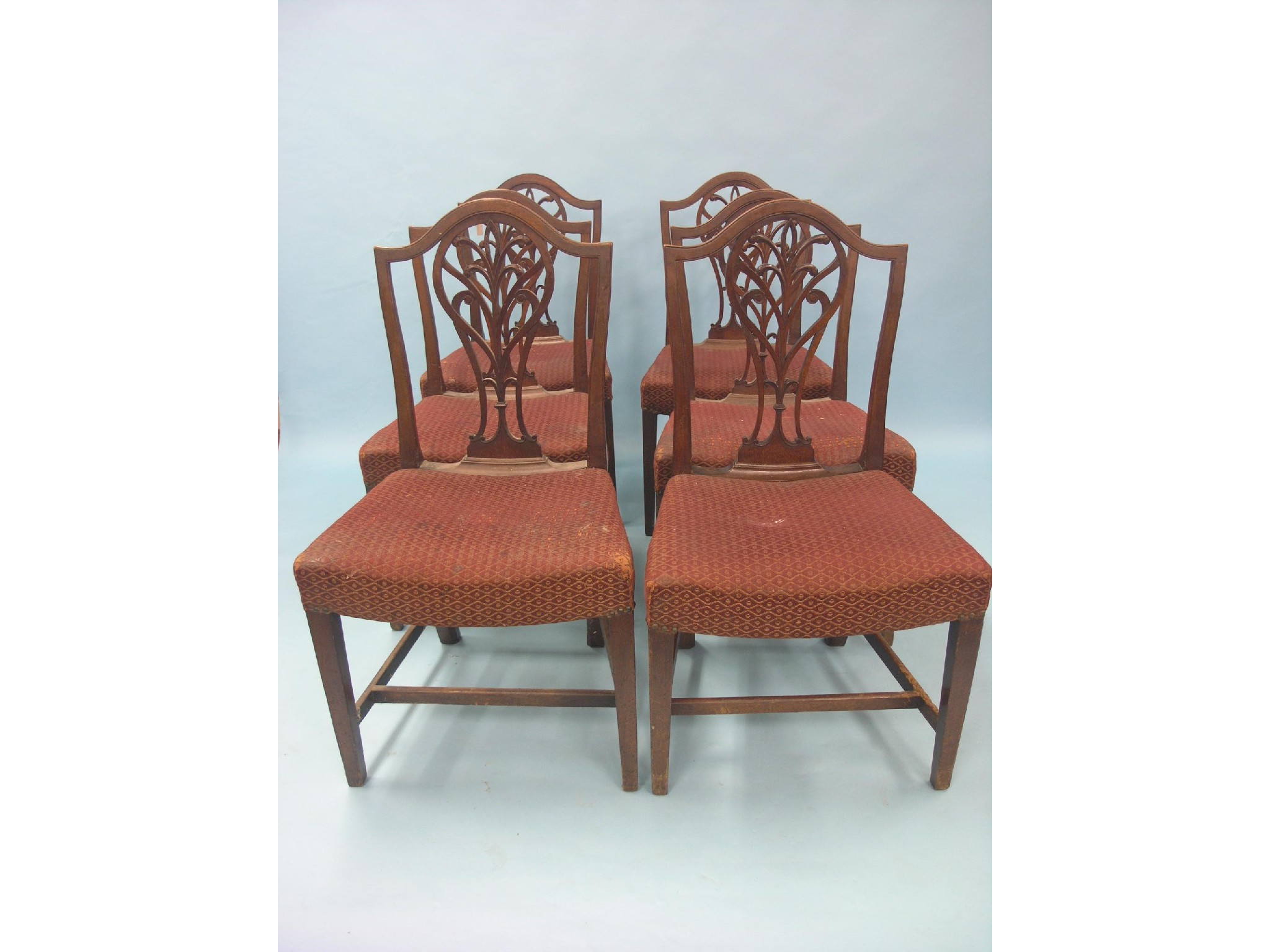 Appraisal: A set of six th century Hepplewhite-style mahogany dining chairs