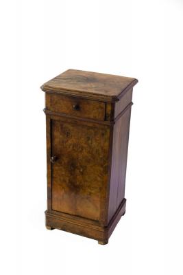 Appraisal: A Victorian walnut bedside pot cupboard with drawer and cupboard