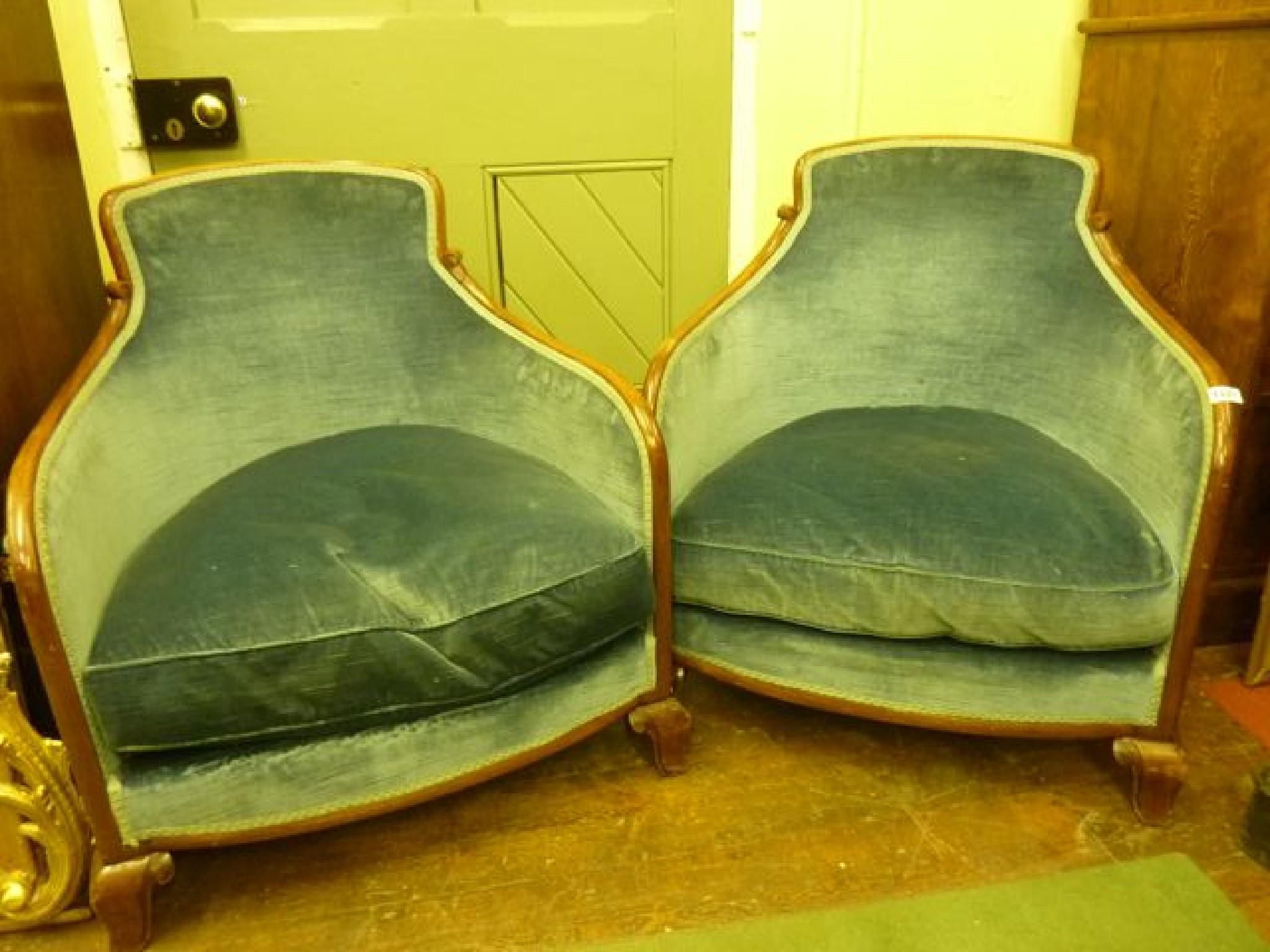 Appraisal: A pair of tub shaped drawing room chairs with upholstered