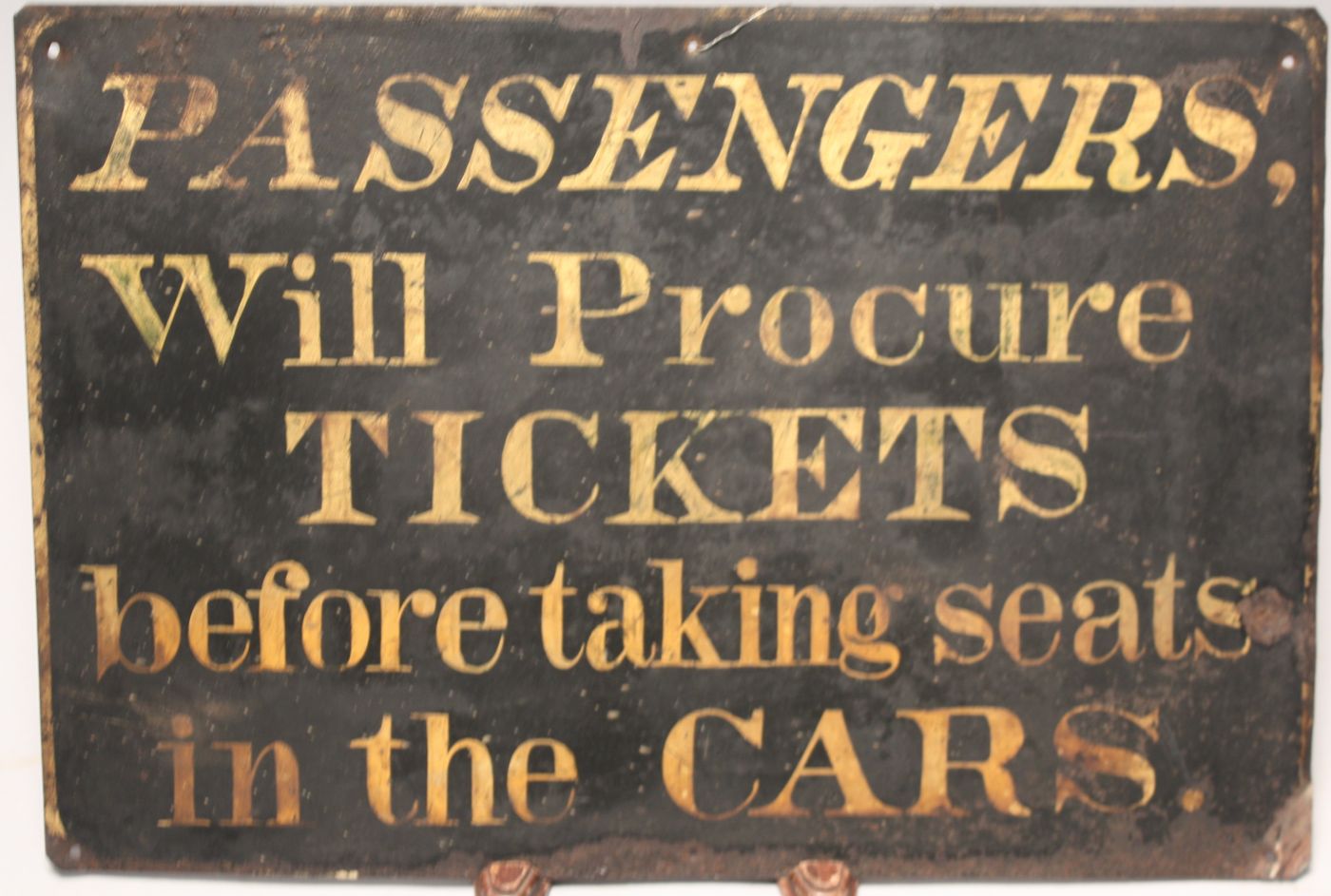 Appraisal: PAINTED TIN TRAIN STATION SIGN th CenturyPassengers Will Procure Tickets