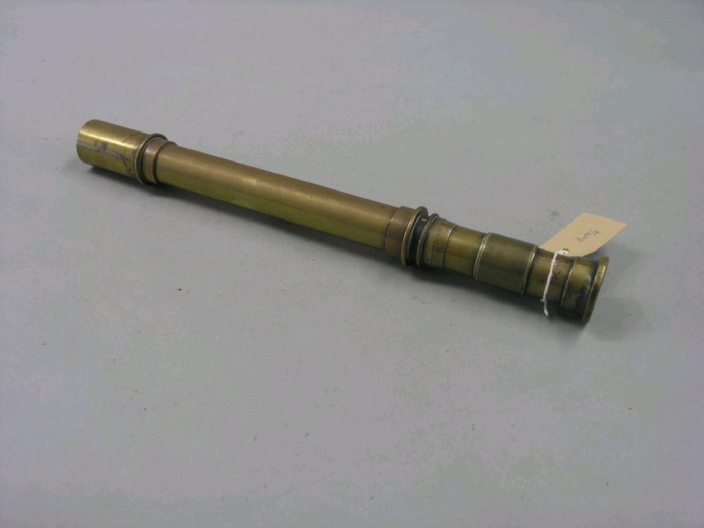 Appraisal: A military brass telescope by Vickers Sons and Maxim Ltd