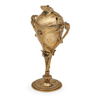 Appraisal: FIGURAL BRONZE CUP WITH COVER Egg form cup with grapevine