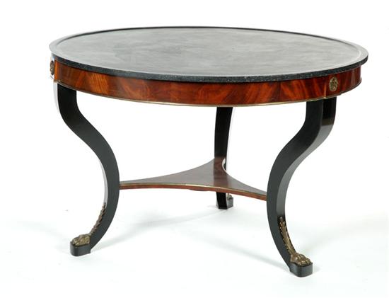 Appraisal: EMPIRE-STYLE CENTER TABLE Twentieth century mahogany In the French taste