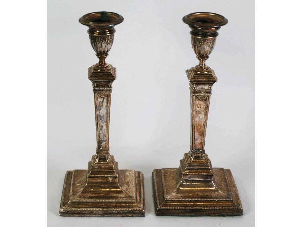 Appraisal: PAIR OF LATE VICTORIAN ADAMS STYLE SILVER CANDLESTICKS by James