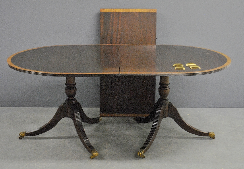 Appraisal: - Baker Furniture Co banded mahogany table with extra leaf