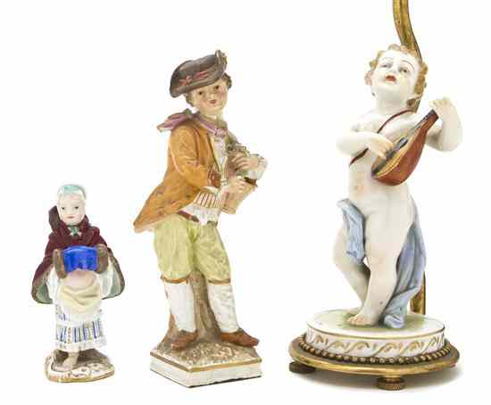 Appraisal: A Collection of Three Continental Porcelain Figures comprising a K