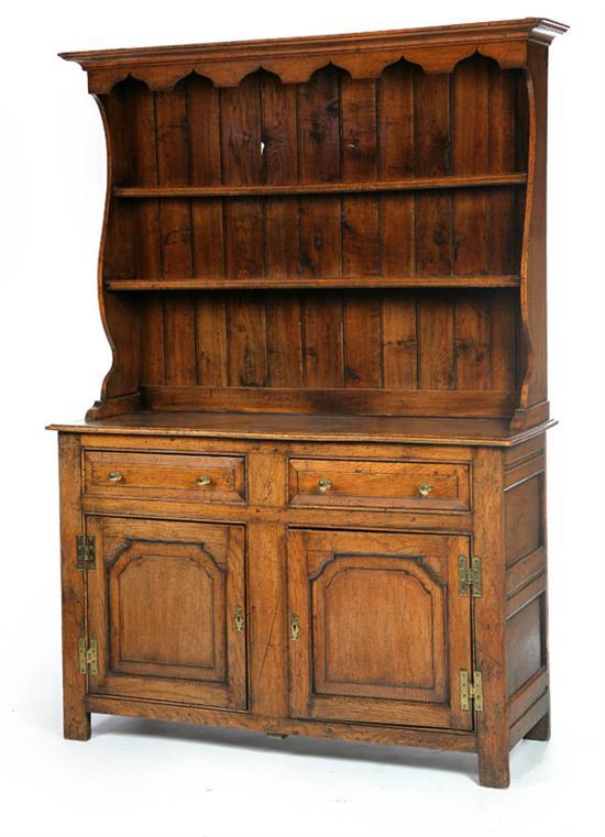 Appraisal: WELSH DRESSER England th century oak Two-piece the upper section