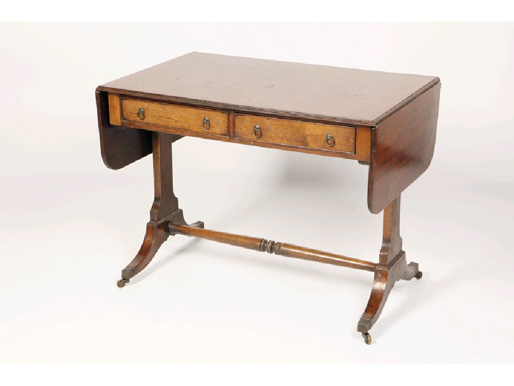 Appraisal: A REGENCY MAHOGANY SOFA TABLE the rectangular top with twin